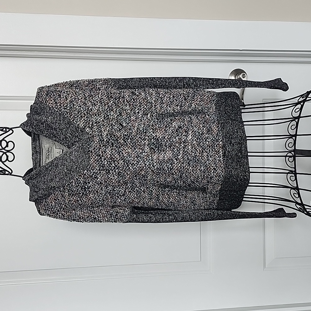 Lucky Lotus (Lucky) hooded sweater. Knit detail on front.